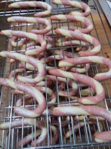 Candy cane cookies made with strawberry beet powder combo.